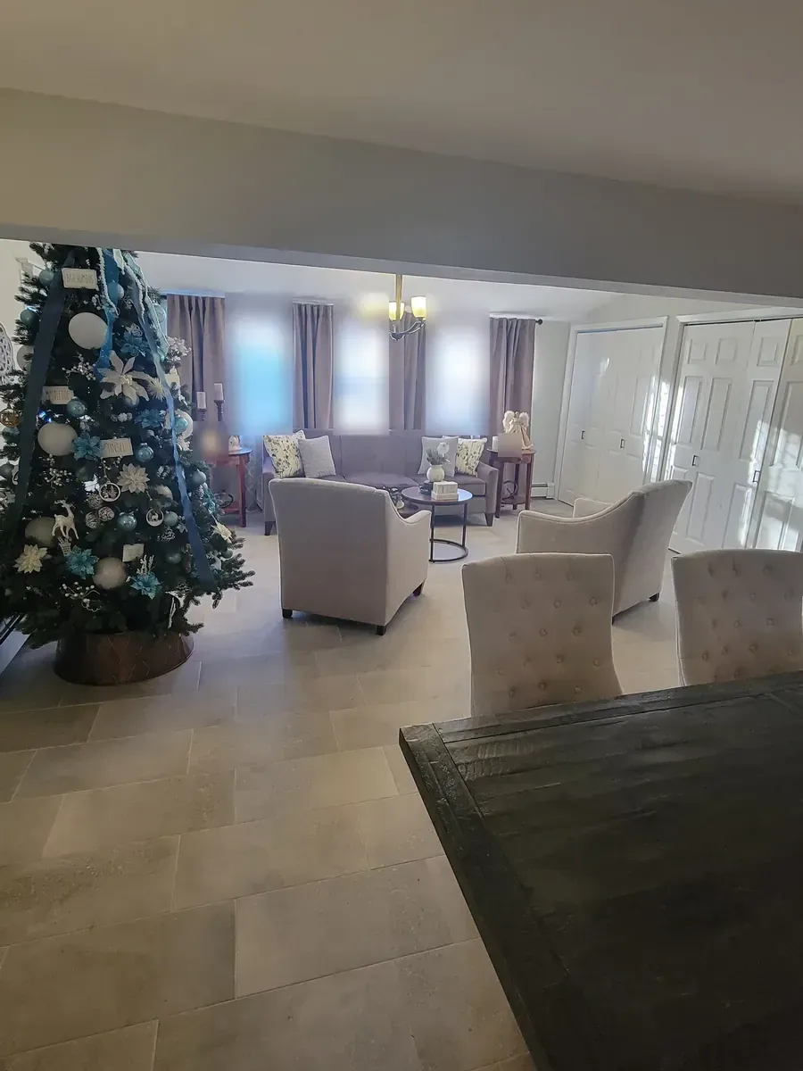 Living room remodel in Levittown, NY: large floor tile, seen from the dining table